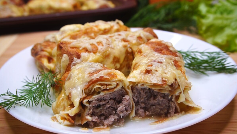 Вкусные рулетики из яичных блинчиков: легкий рецепт для повседневного стола